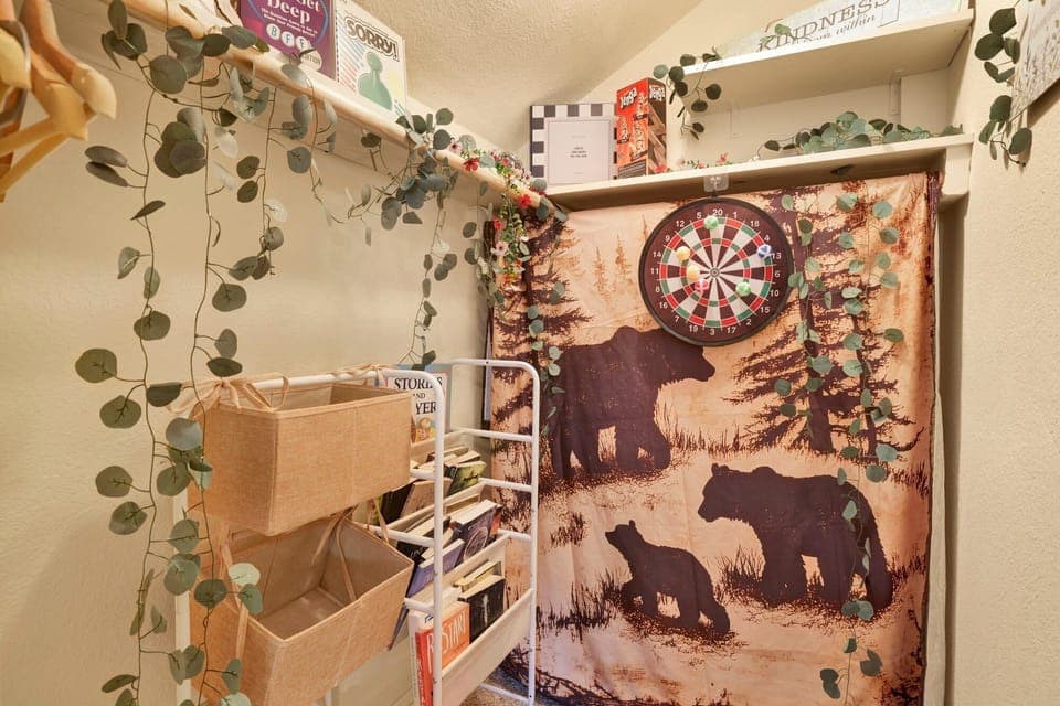 Clean and cozy cabin bathroom with a shower, sink, and toilet—simple, fresh, and comfortable for your everyday needs during a relaxing mountain stay.