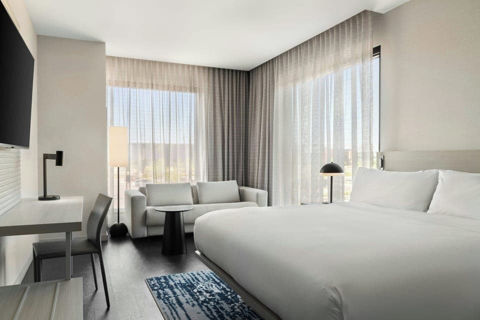 Deluxe Room, 1 King Bed with Sofa bed | In-room safe, blackout drapes, iron/ironing board, travel crib