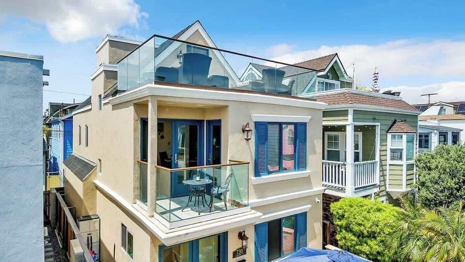 Exterior - 3 story with rooftop deck. Newly painted.