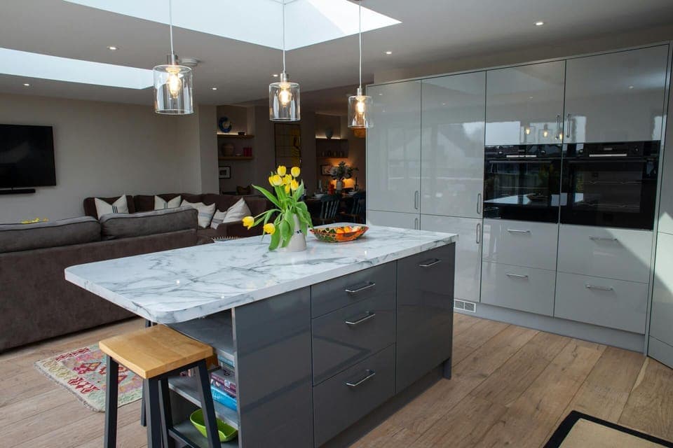 Kitchen with island and double electric ovens
