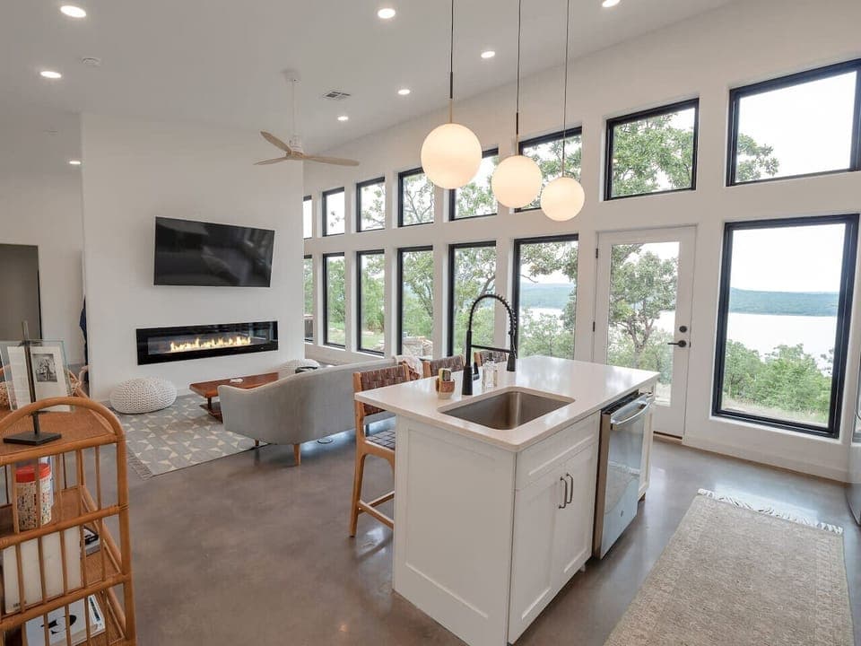 Open floorplan with electric fireplace and smart TV