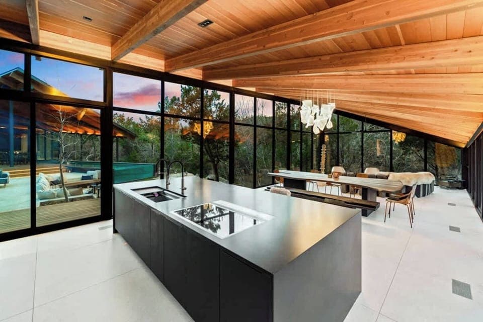 Indulge in the art of culinary creation on the expansive kitchen island, a haven for passionate cooking.