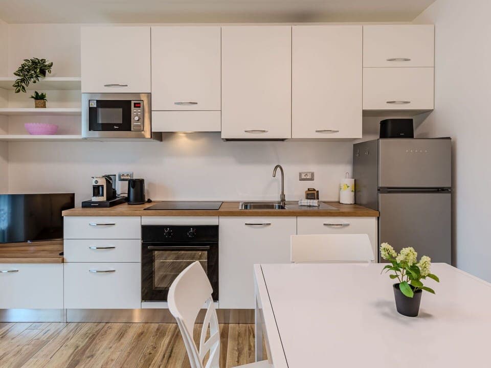 Kitchen Appliance, Furniture, Kitchen, Countertop, Cabinetry, Interior Design, Major Appliance, Wood, Flooring, Home Appliance