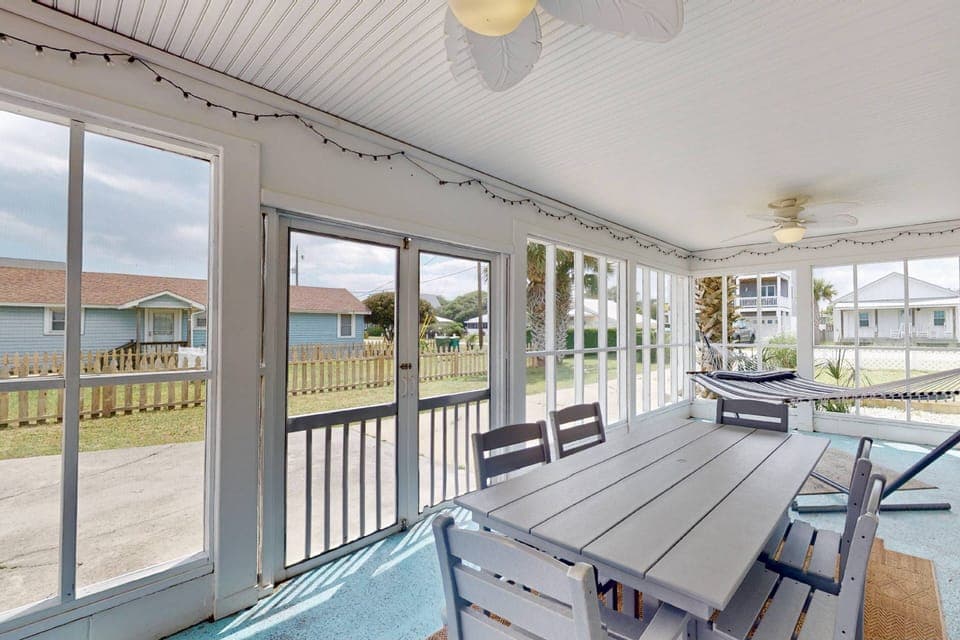 You'll get tons of fresh air without worrying about the bugs on the screened in porch at Lorraine's