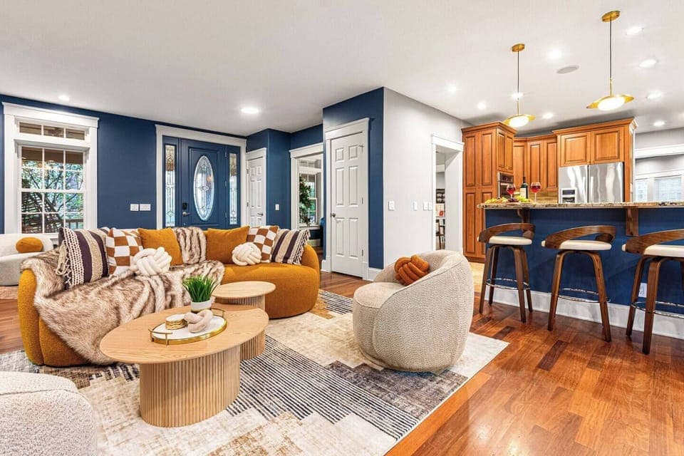 The first of two living rooms offers plenty of space for your group to spread out and relax. Featuring a cozy fireplace, a separate conversation nook, and a main seating area for up to seven guests, it’s perfect for gathering together or enjoying a little quiet time.