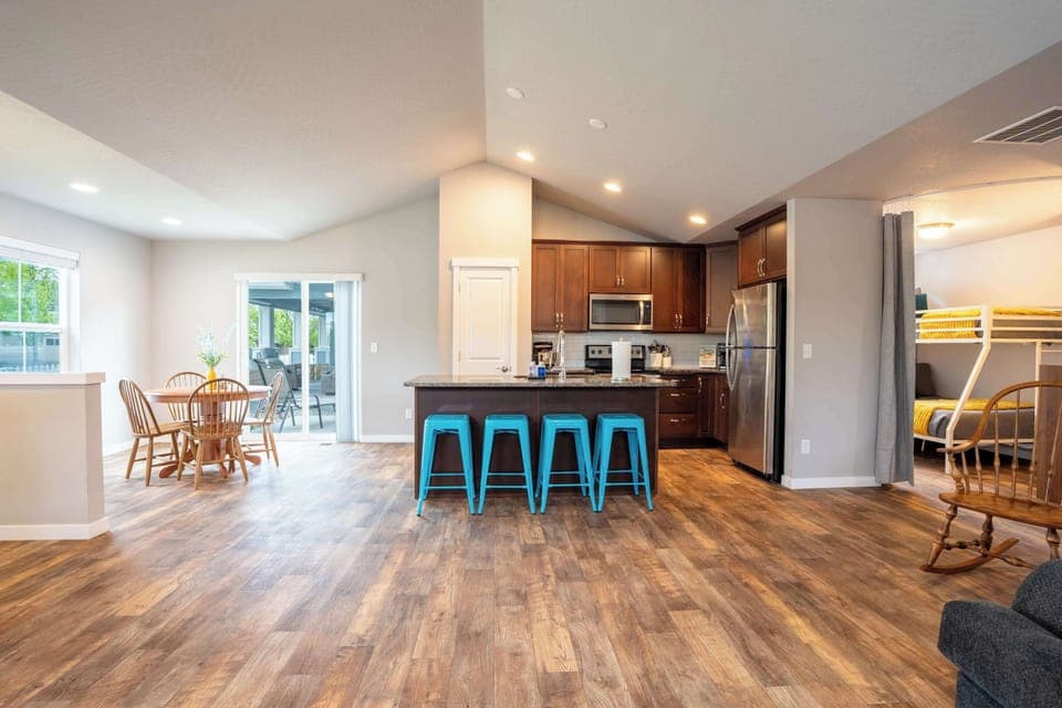 Open kitchen and dining space, perfect for shared meals, games, or working remotely.