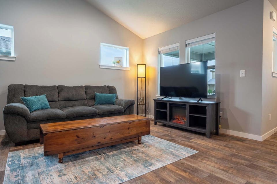 Relax after a day exploring Coeur d’Alene — comfortable seating, Smart TV, and a cozy space to unwind.