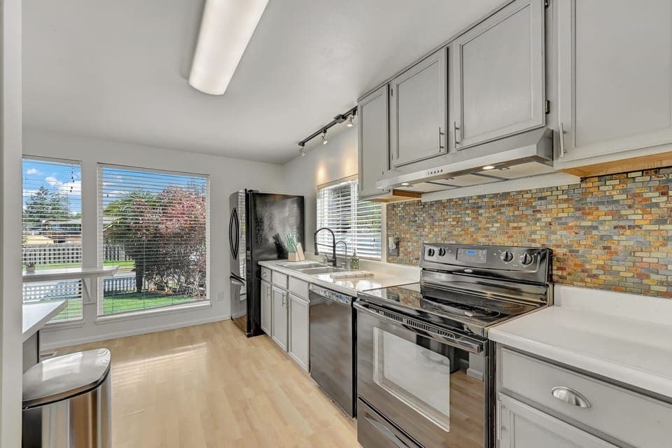 The spacious, fully equipped kitchen makes delicious home made meals a reality.