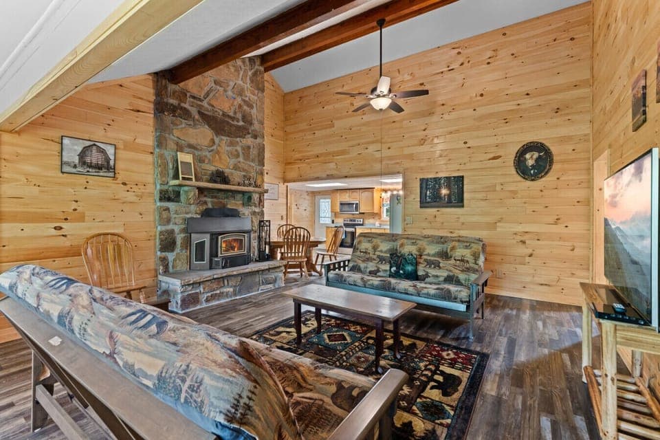 From morning coffee to evening game time, this open-concept living area blends comfort, warmth, and togetherness in one inviting space.