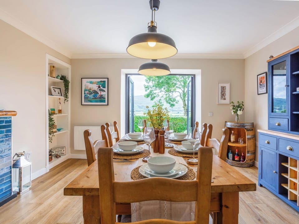 Dining room with patio doors opening onto the Garden | Greenhill, Blackwaterfoot