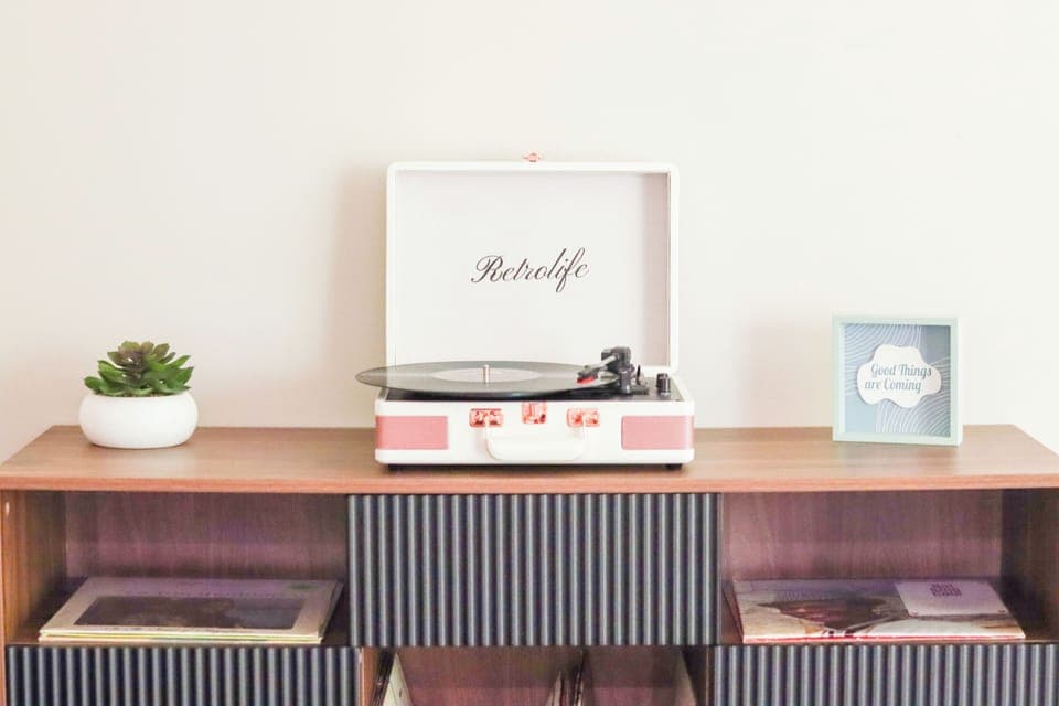 Set the mood with vinyl vibes on our classic record player!