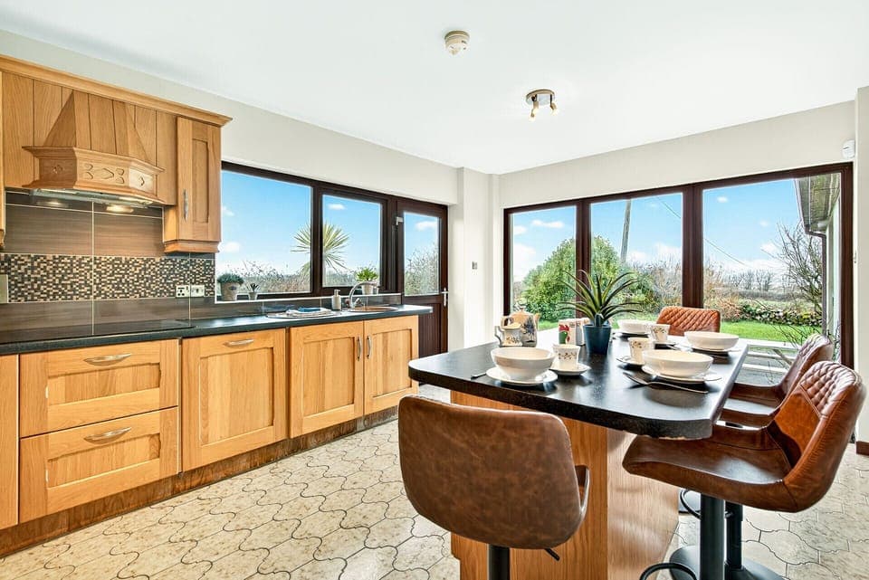 Fully equipped kitchen with garden views
