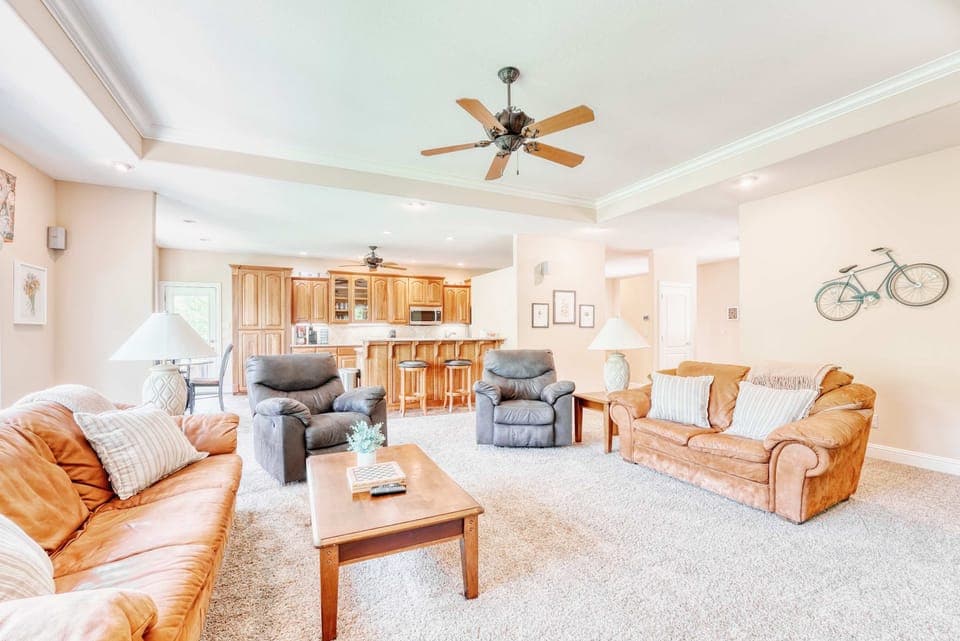 Spacious and sophisticated living room, showcasing a harmonious blend of modern and classic design elements. A haven of warmth and elegance.