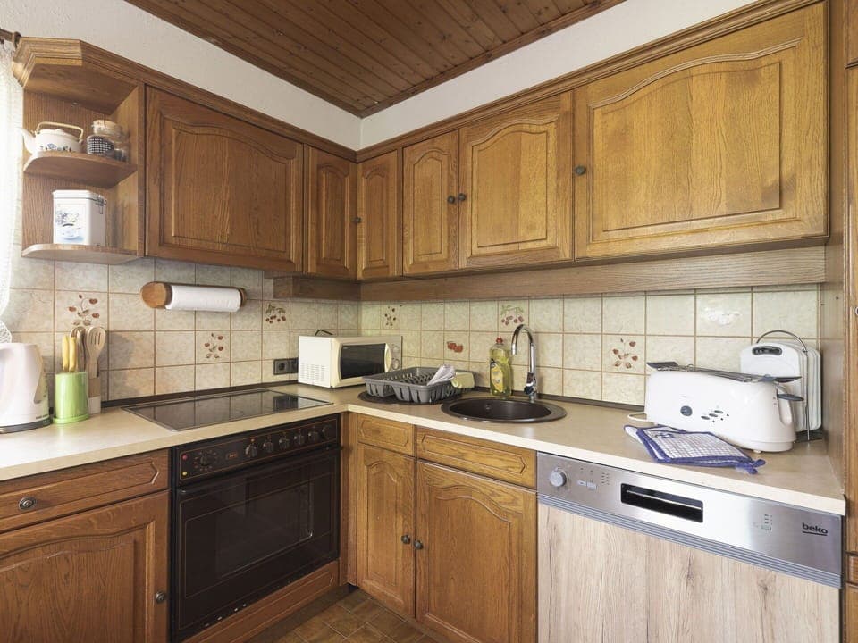 Cabinetry, Kitchen, Countertop, Wood, Interior Design, Kitchen Appliance, Furniture, Flooring, Drawer, Cupboard