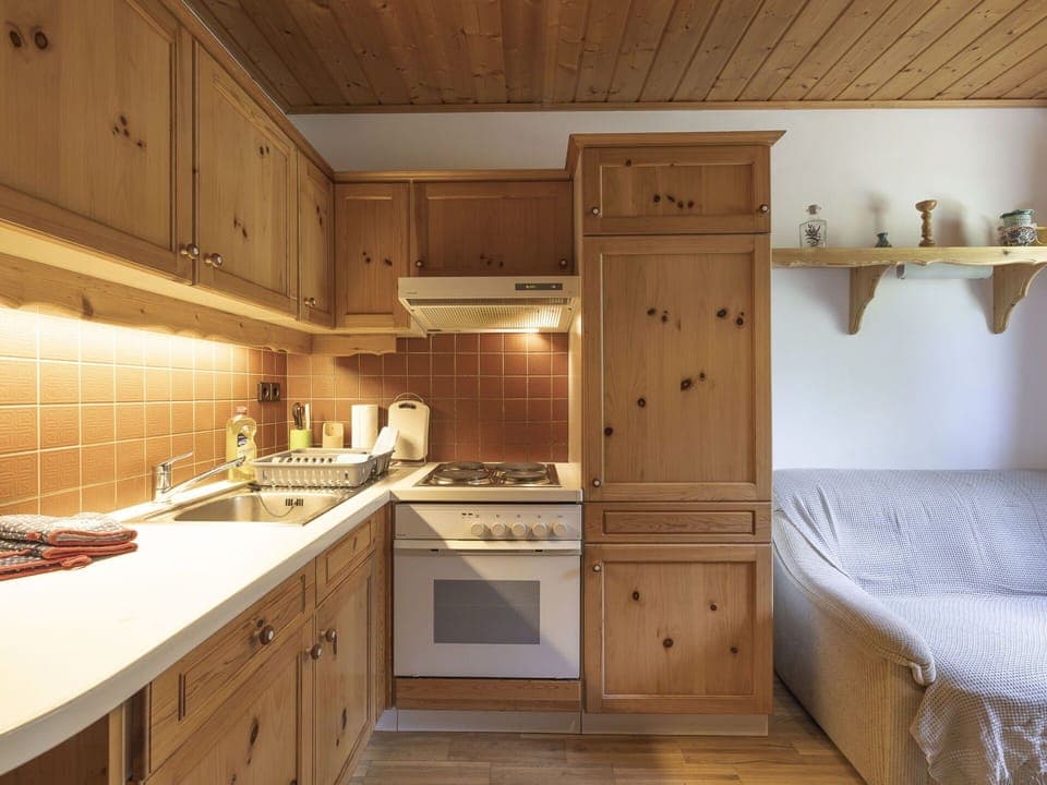 Furniture, Cabinetry, Kitchen, Interior Design, Wood, Countertop, Flooring, Ceiling, Floor, Kitchen Appliance