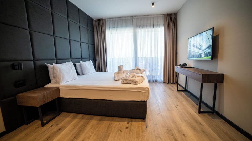 Deluxe Double or Twin Room, Mountain View | In-room safe, desk, laptop workspace, blackout drapes