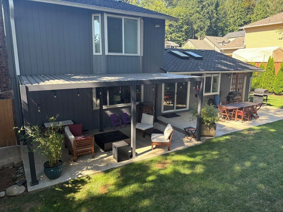 Backyard with covered gas fireplace sitting area