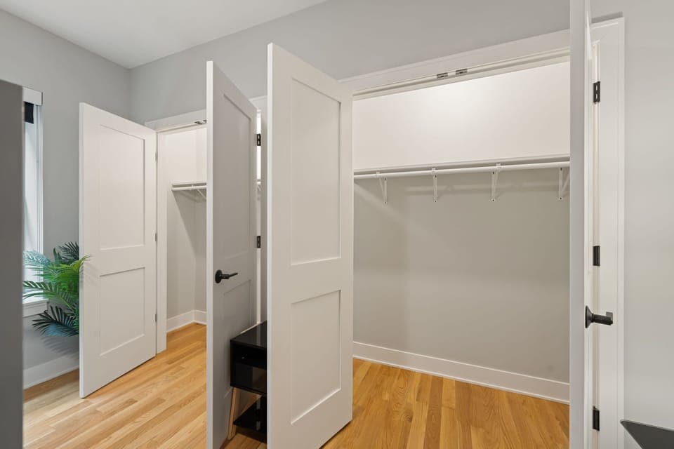 Clean hallway that keeps the space feeling open & clutter-free.