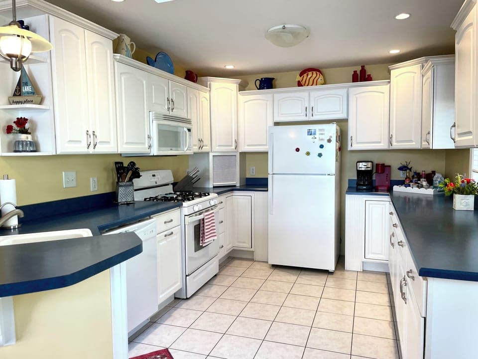 Cook up a feast in the well stocked kitchen with plenty of counter space for all your culinary creations.