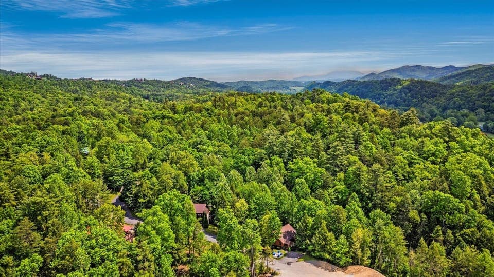 Stunning drone aerial view of the cabin’s serene surroundings