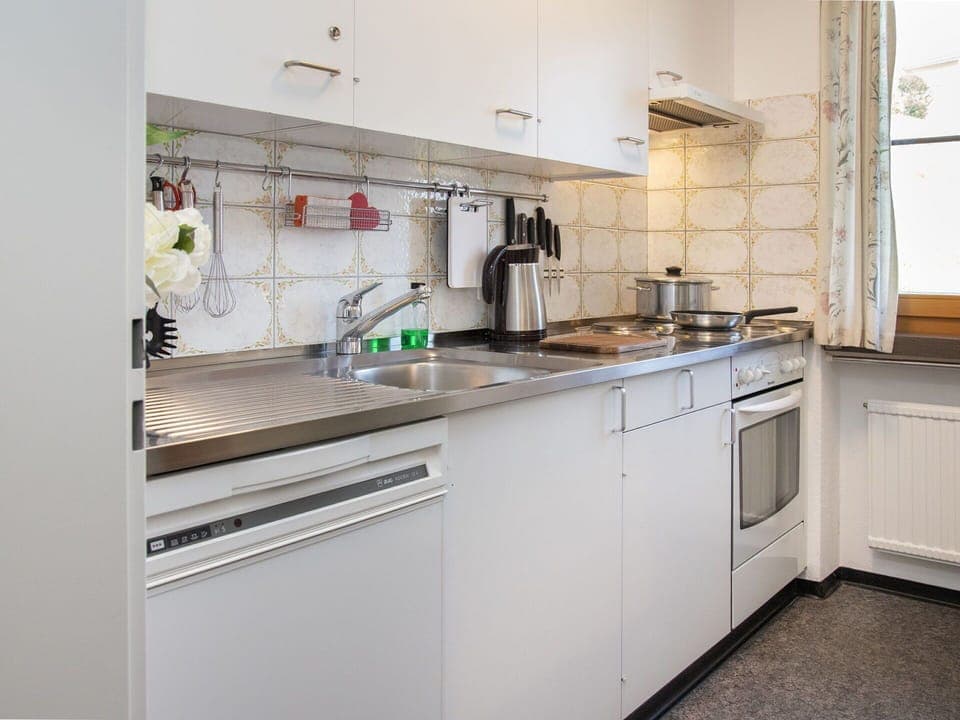 Kitchen, Kitchen Appliance, Countertop, Kitchen Sink, Major Appliance, Sink, Cabinetry, Flooring, Interior Design, Plumbing Fixture