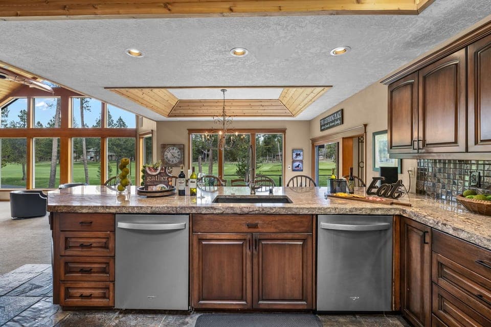 Kitchen view with dual dishwashers