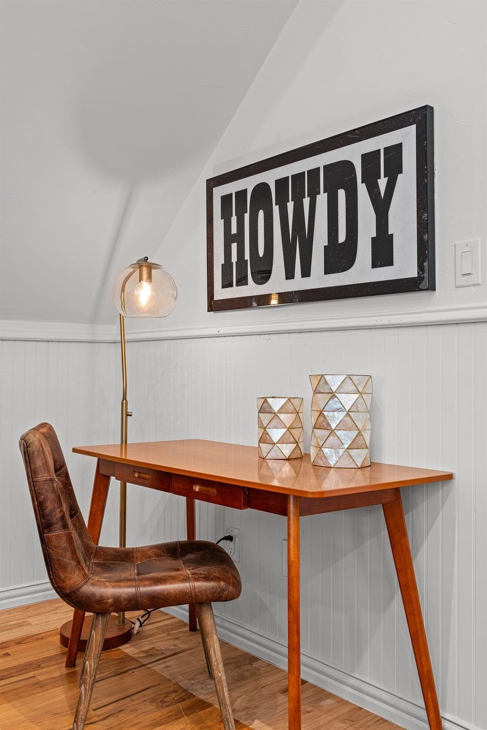 Take a seat at the one-sided table and chair—a perfect little nook for coffee, reading, or quiet moments.