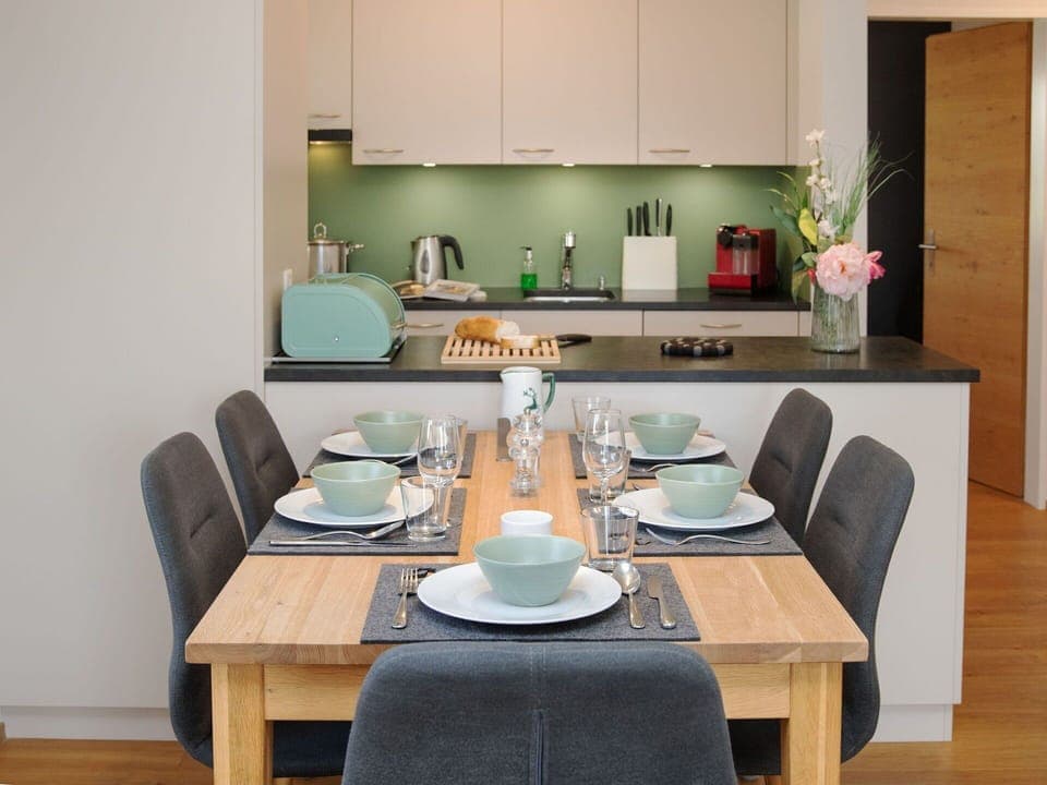 Furniture, Interior Design, Flooring, Wood, Countertop, Kitchen & Dining Room Table, Kitchen, Floor, Room, Chair