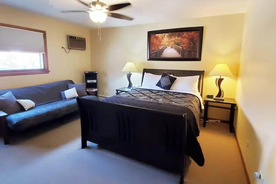 Bedroom 1 has a Queen bed and a futon that folds down into a Full-size bed.