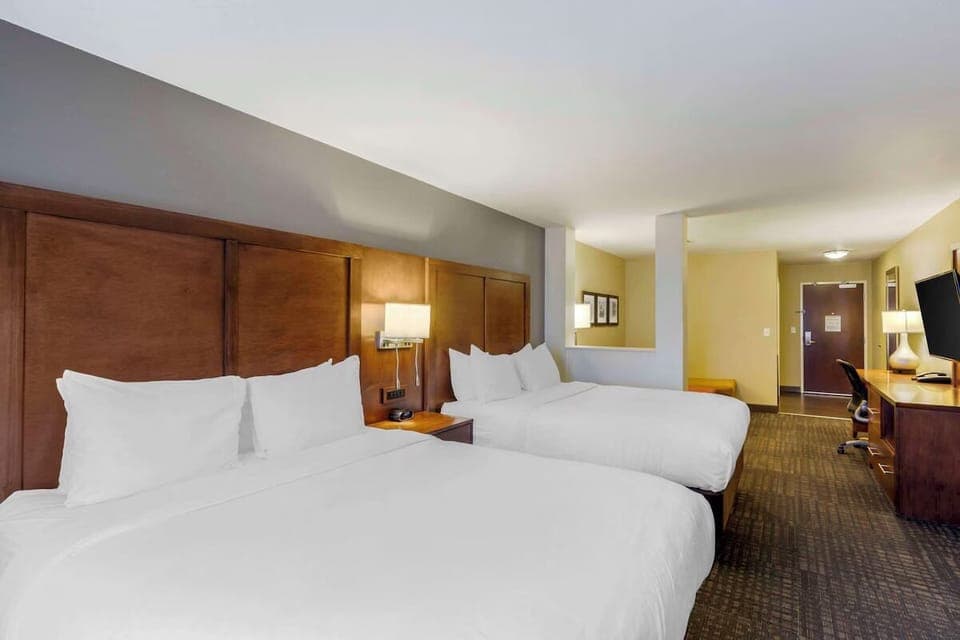 Drift off on cloud-soft pillows in a roomy double-queen.