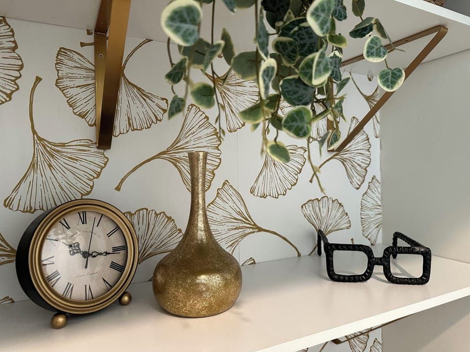 nviting reading nook with soft lighting and a comfy chair for unwinding.