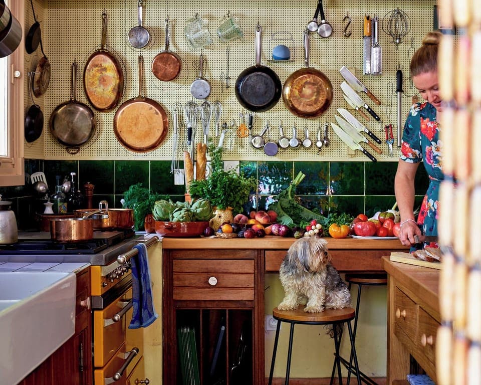 Julia Child's French pegboard kitchen awaits you and your culinary creations.