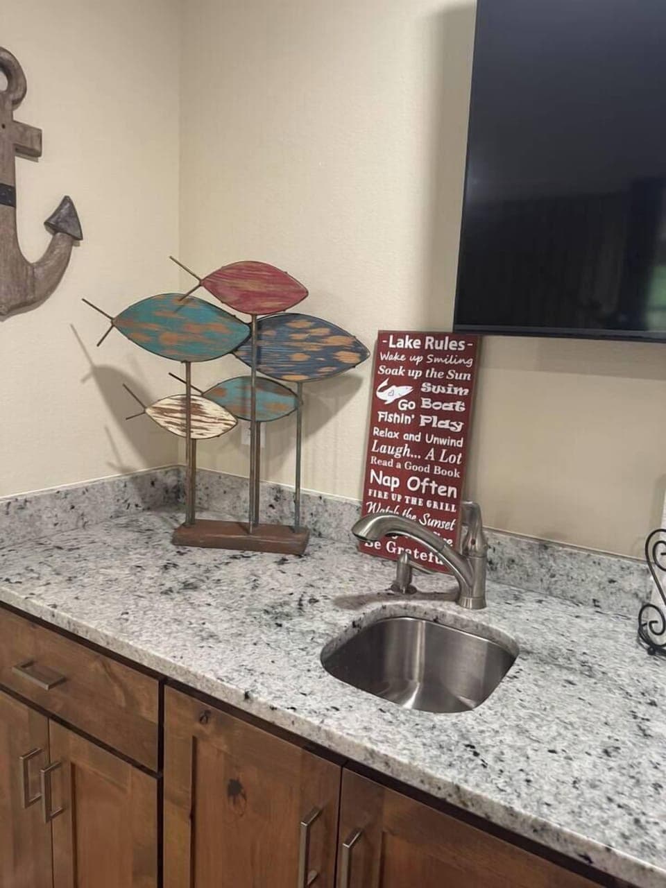 Lower level Bar Sink above Beverage Fridge