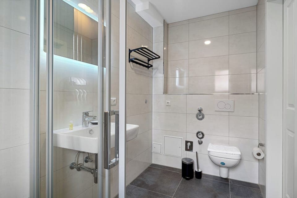 Hair dryer, towels, soap, shampoo