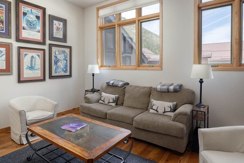 Living Room - Spacious living room with high ceilings and views to the west