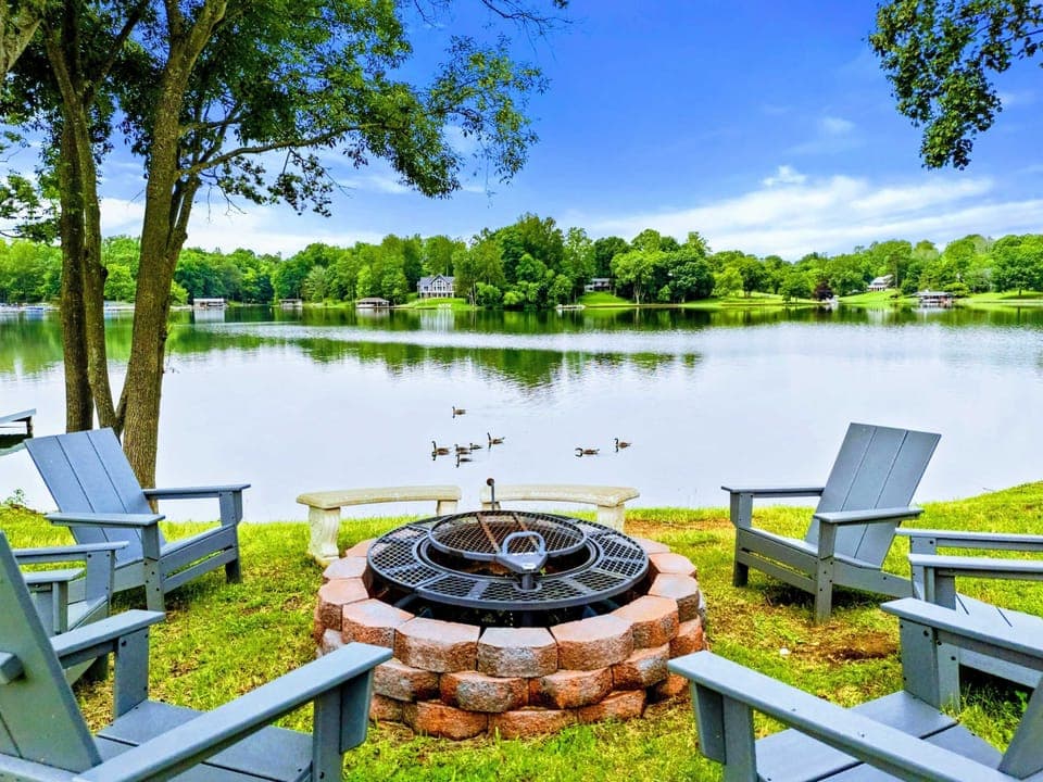 Lakeside Fire Pit - Pull up an Adirondack chair, watch the ducks glide by, and let the evening settle in around the fire.