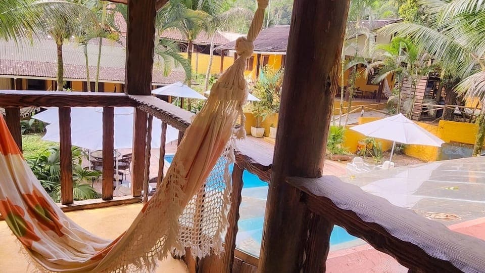 Superior Triple Room | Living area | TV