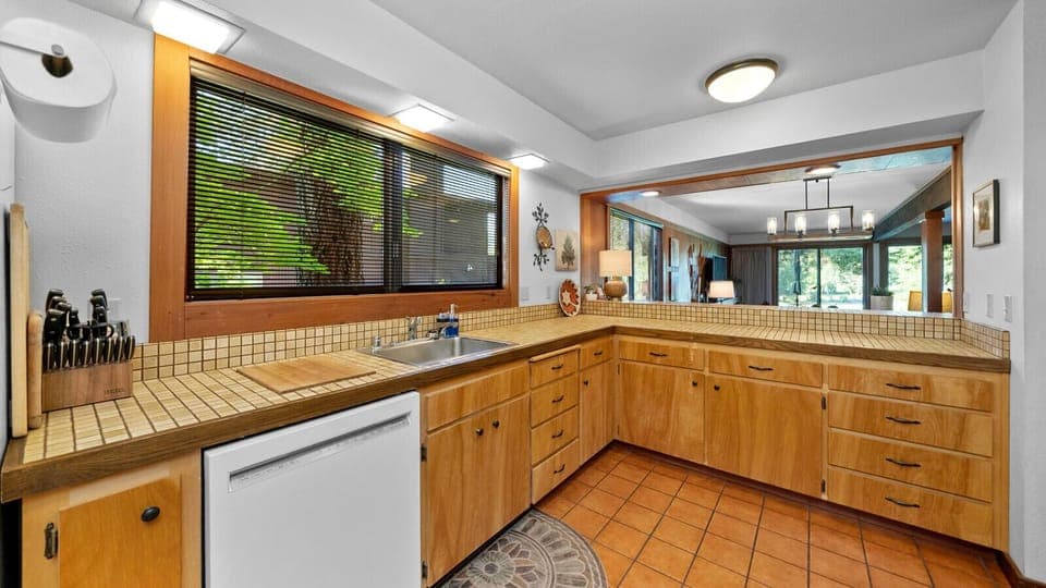 Kitchen opens to dining area