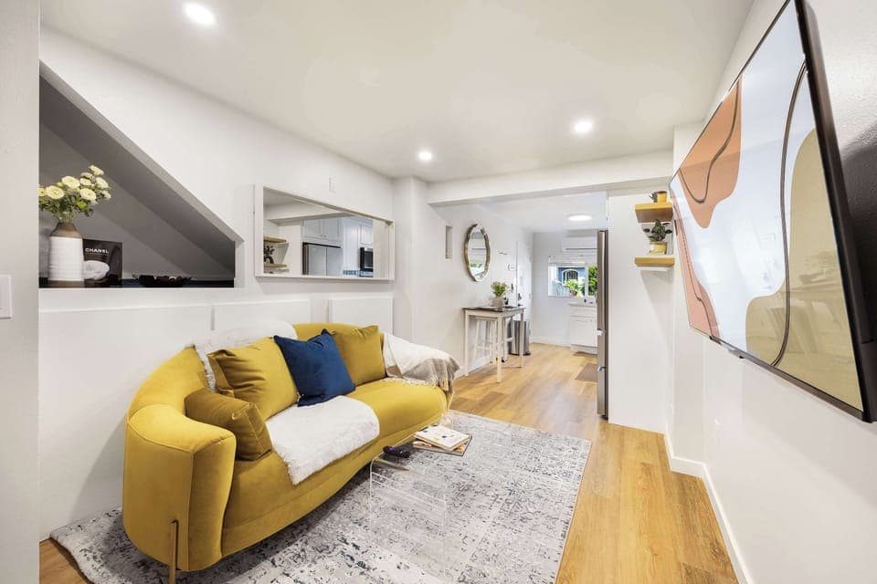 Here is the cozy living room with a comfortable sofa