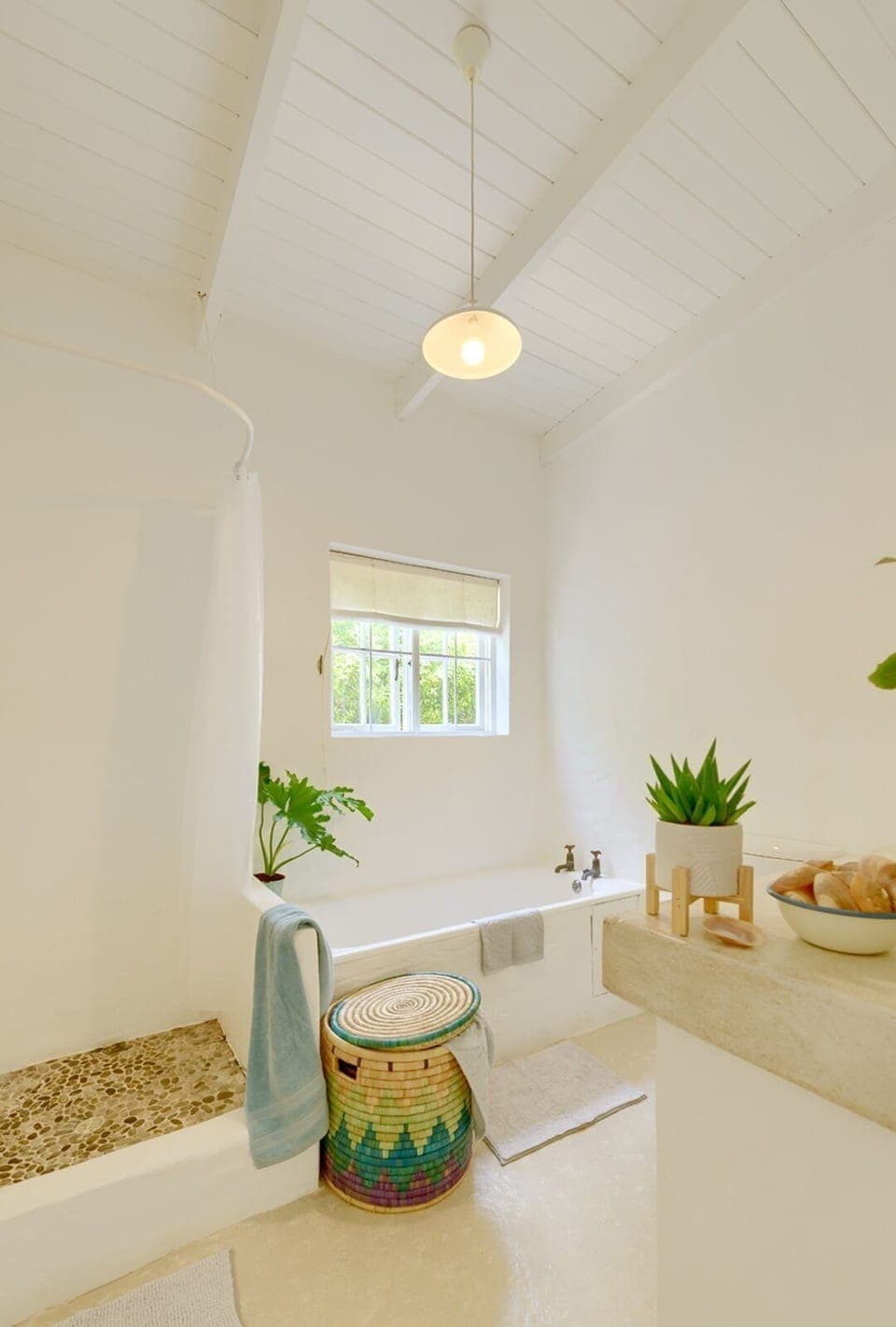 Downstairs bathroom with bath, shower, basin and toilet