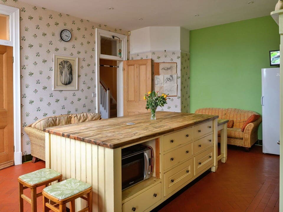 Furniture, Interior Design, Flooring, Cabinetry, Floor, Wood, Kitchen, Countertop, Ceiling, Room