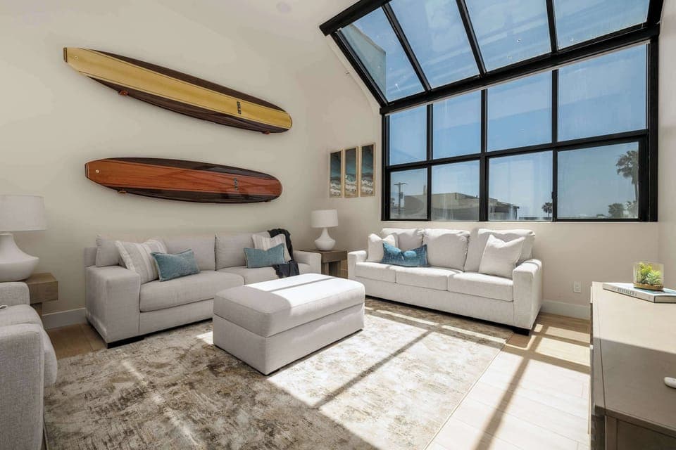 Living room (AC, TV, 2 Sofa beds and  lots of natural light)