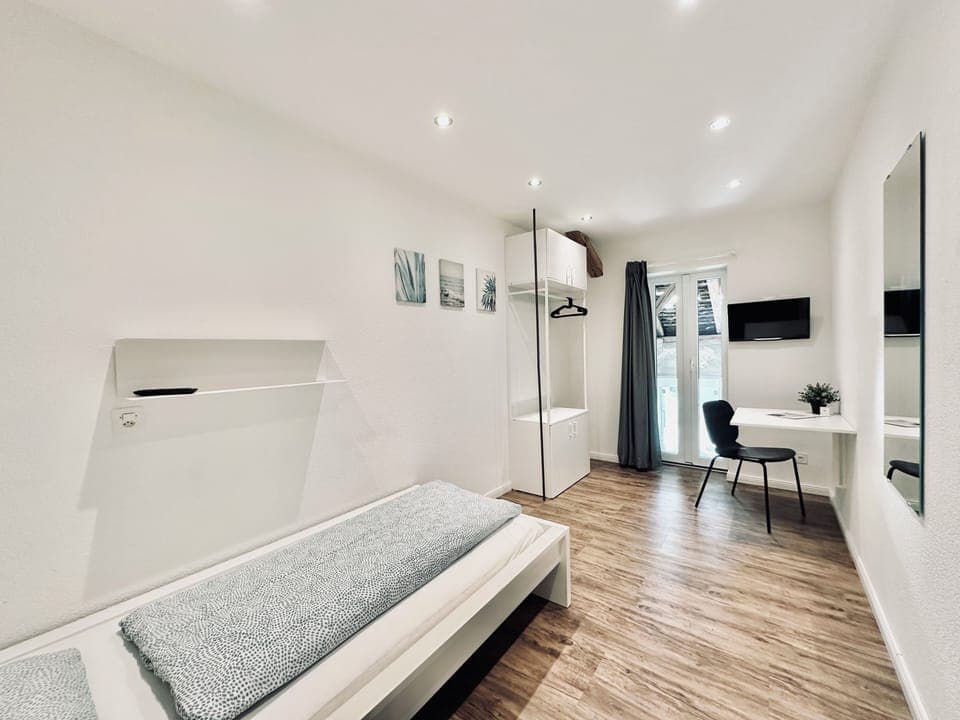 Einzelzimmer mit Allgemeinbad | Free WiFi