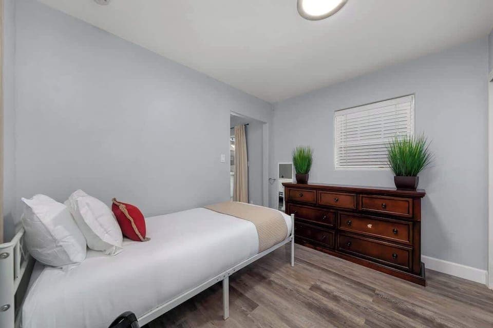 Twin bed w/ privacy wall located in primary