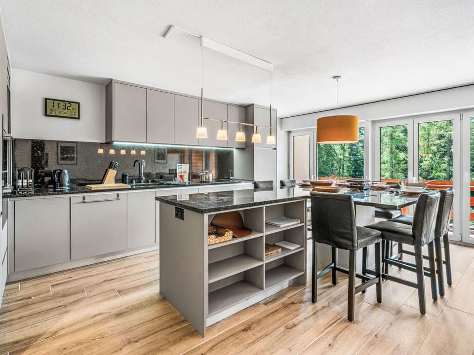 Furniture, Kitchen, Countertop, Interior Design, Kitchen Appliance, Cabinetry, Flooring, Wood, Ceiling, Light Fixture