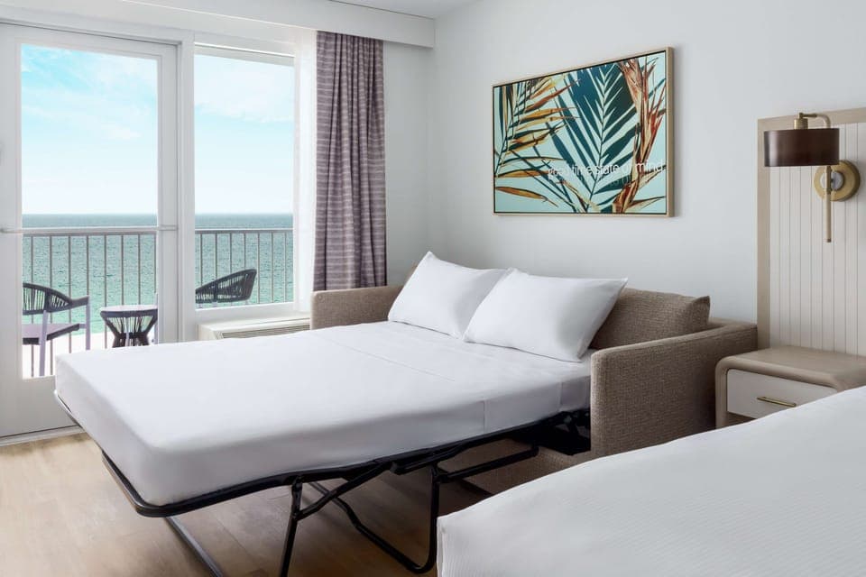 Room, 1 King Bed (Gulf Front Balcony) | Living area | 55-inch Smart TV with digital channels, streaming services