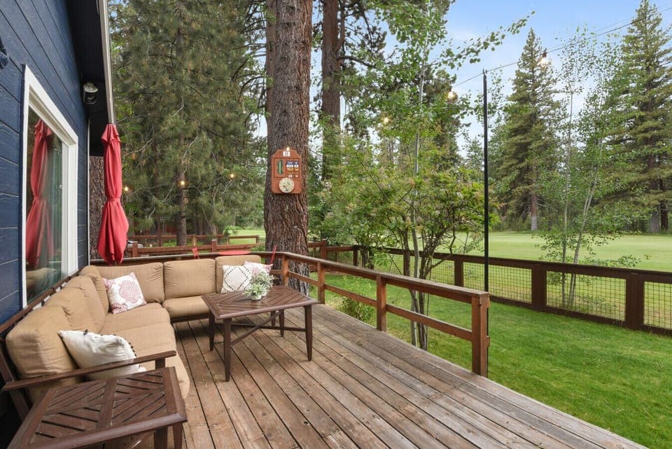 Deck with cozy lounge area overlooking the 8th hole of Old Brockway Golf Course