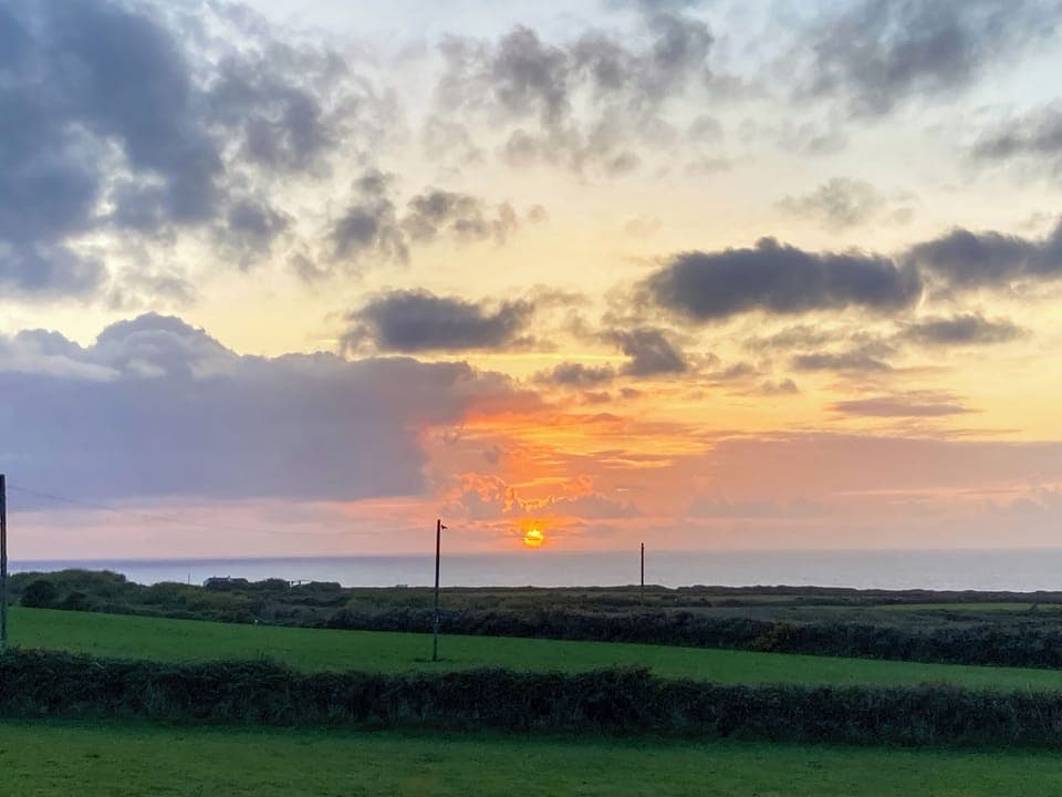 Sunset view (drone flying above the garden) | Gwennel Nook, St Agnes