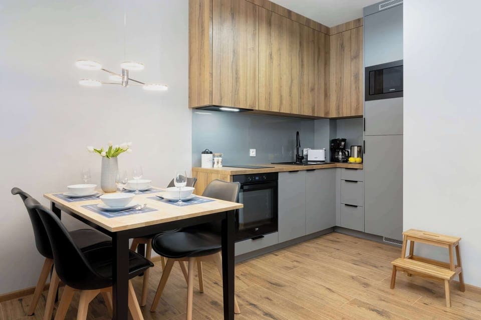 The fully equipped kitchenette includes everything you need for a home-cooked meal.
