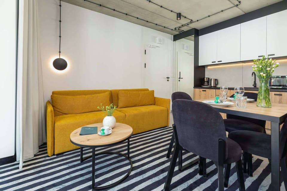 Living room with a comfortable sofa and TV. 